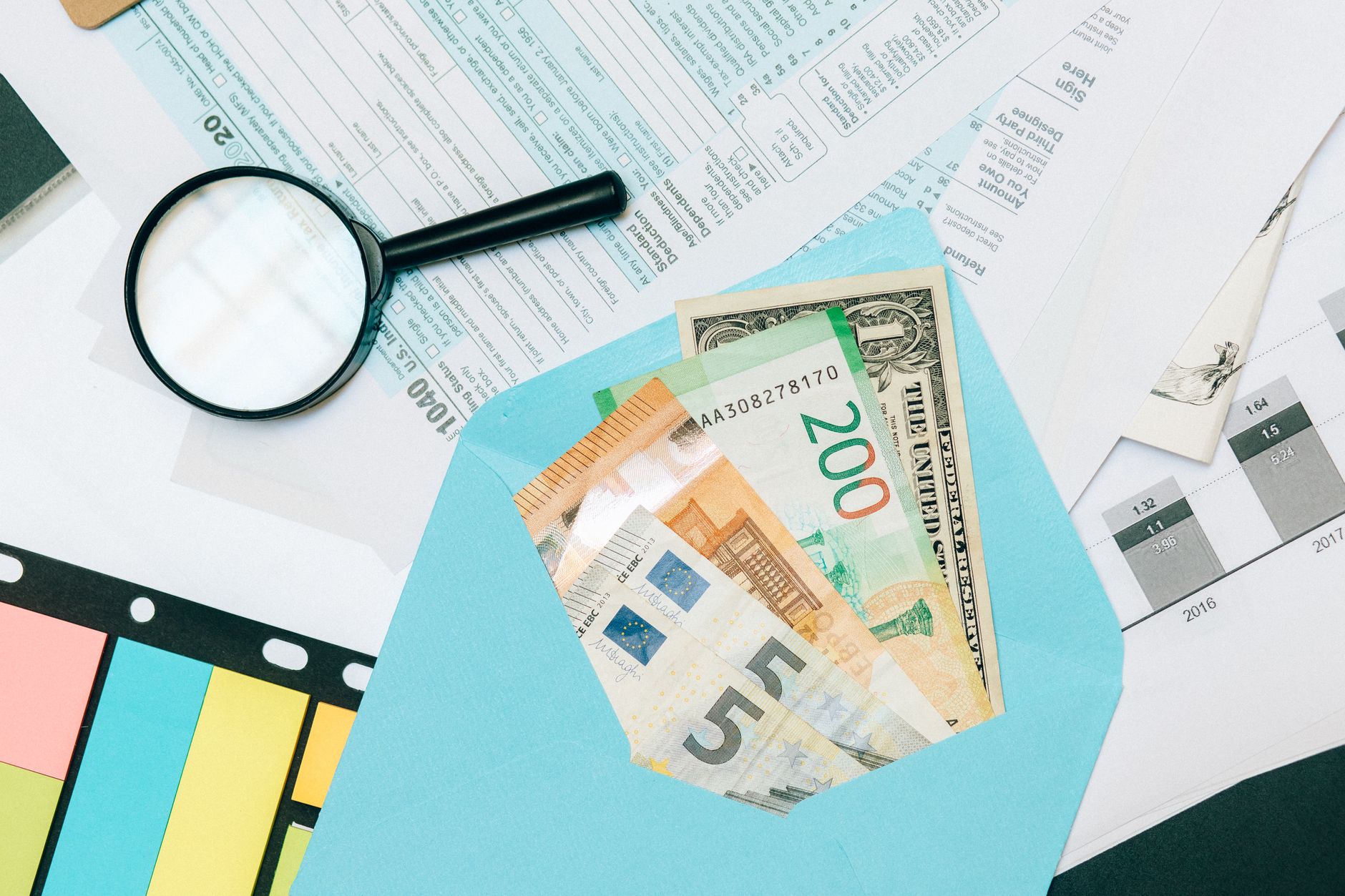 Close-up view of currency details and high-stakes auditing items